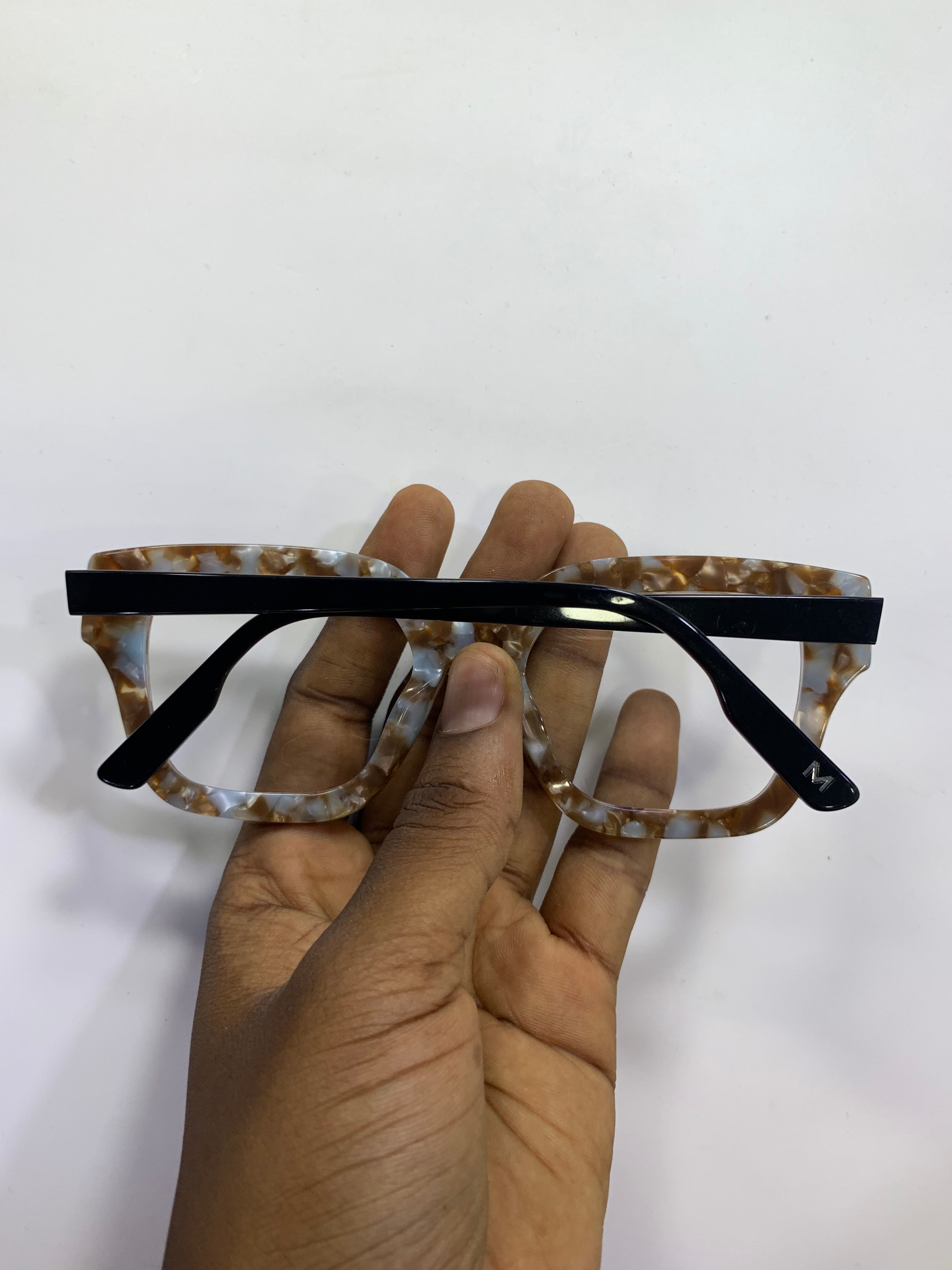 The Isoke Acetate Glass